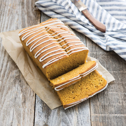 Nordic Ware loaf pan with baked bread inside demonstrating reliable browning benefit
