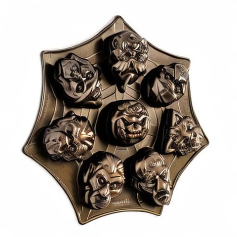 Nordic Ware table display of decorated monster cakelets for festive serving impact
