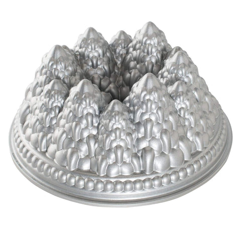 Nordic Ware front view of Pine Forest pan showing full mold and sparkle finish, highlights design