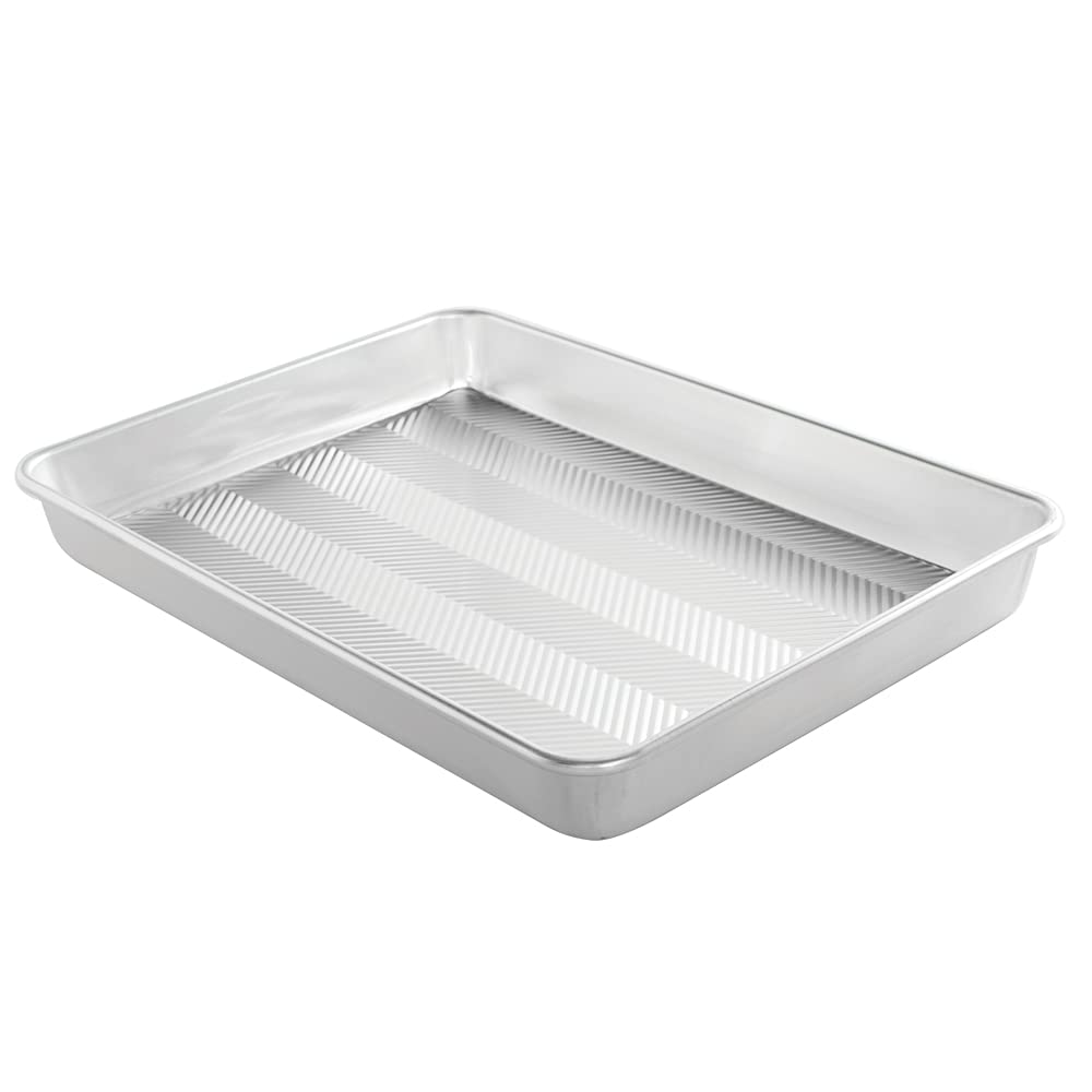Nordic Ware front view of high-sided sheet pan showing size and sturdy rims for reliable baking