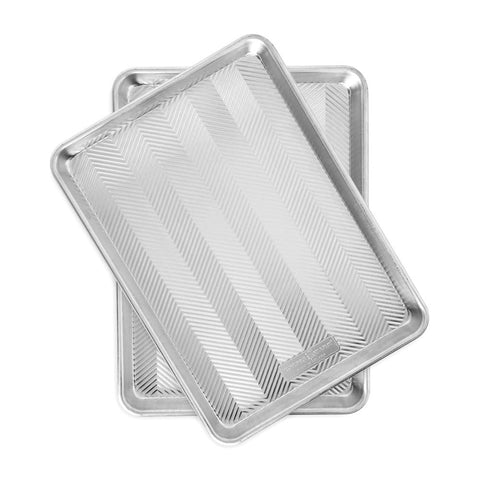 Nordic Ware front view showing full half sheet and utility benefit of even heating