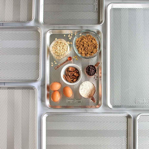 Nordic Ware half sheet holding roasted vegetables for crisping benefit