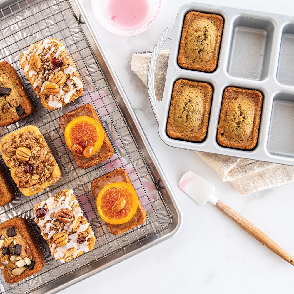 Nordic Ware Procast with freshly baked mini loaves demonstrating even browning