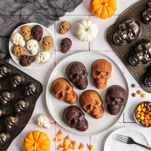 Nordic Ware skull cakelets served on plate styled for a Halloween party presentation