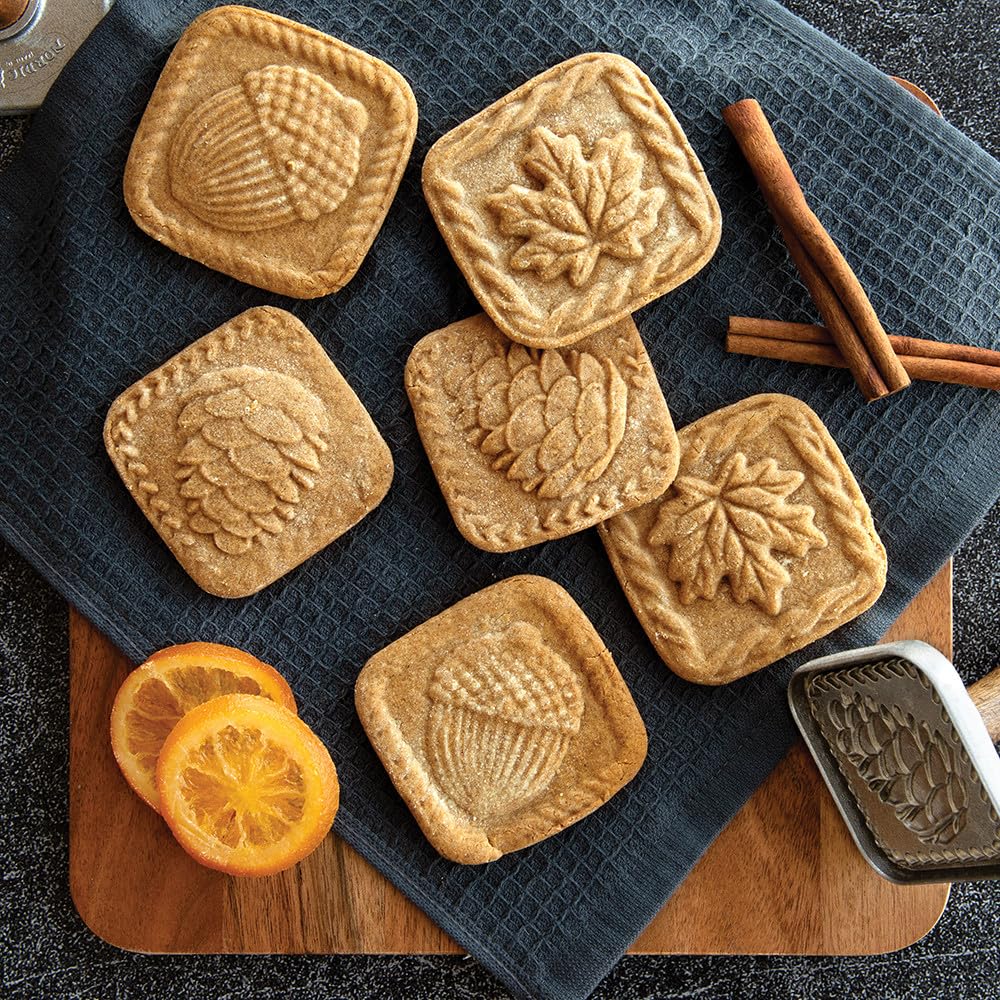 Nordic Ware wooden handle detail on cookie stamp, comfortable grip for easy pressing