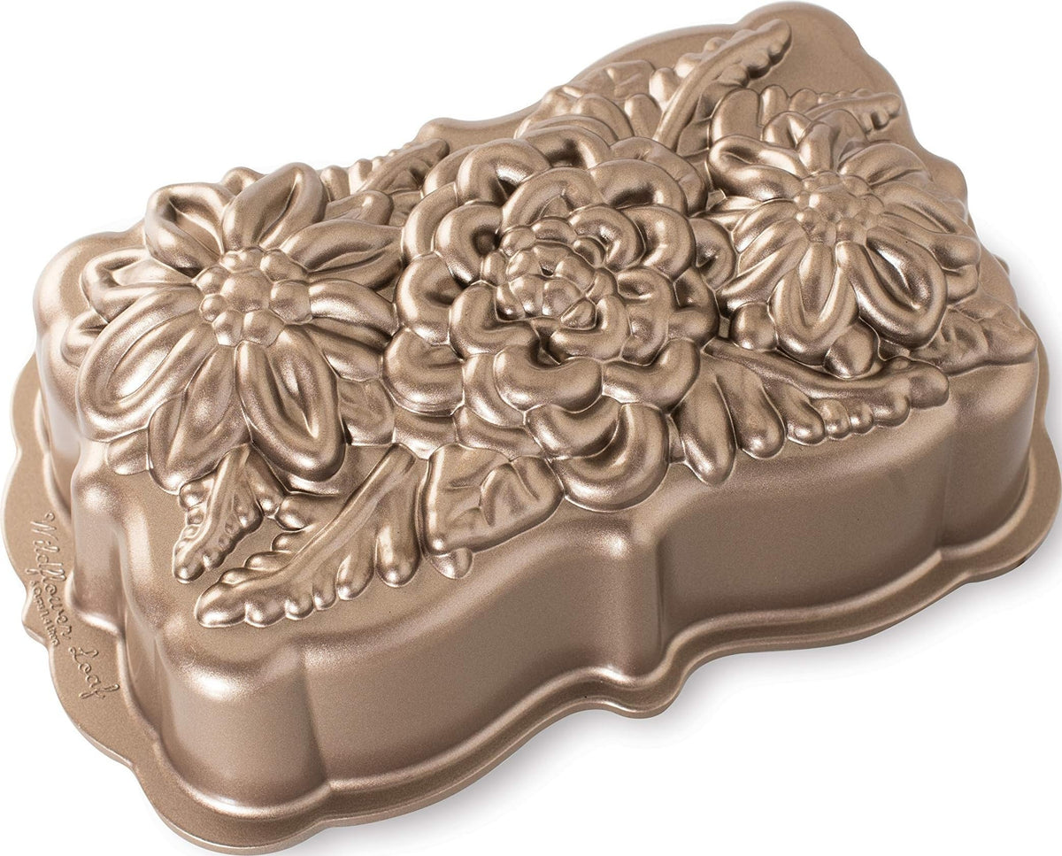 Nordic Ware loaf pan front view showing toffee finish and floral design for decorative loaves