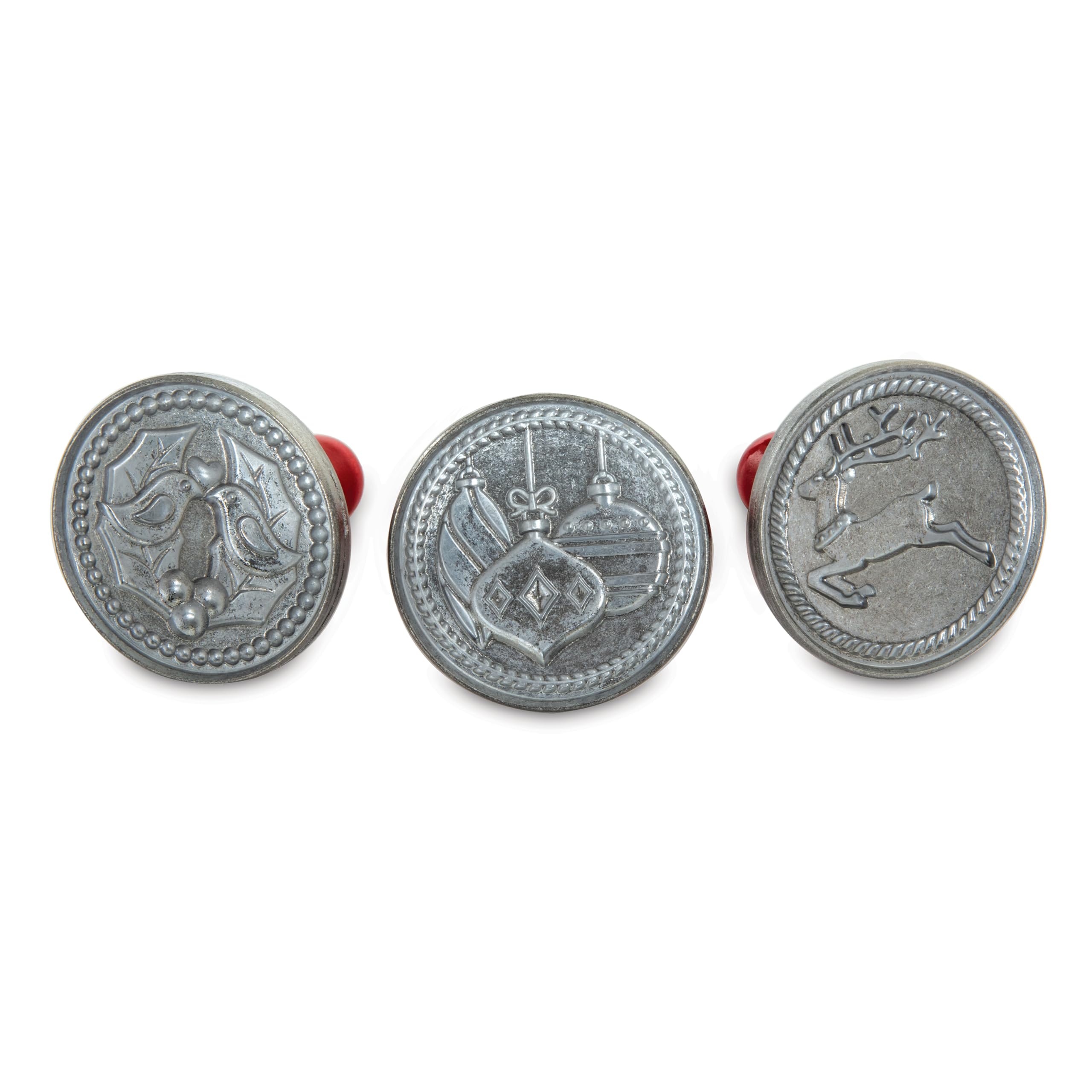 Nordic Ware front view of three cookie stamps showing festive designs and durable build