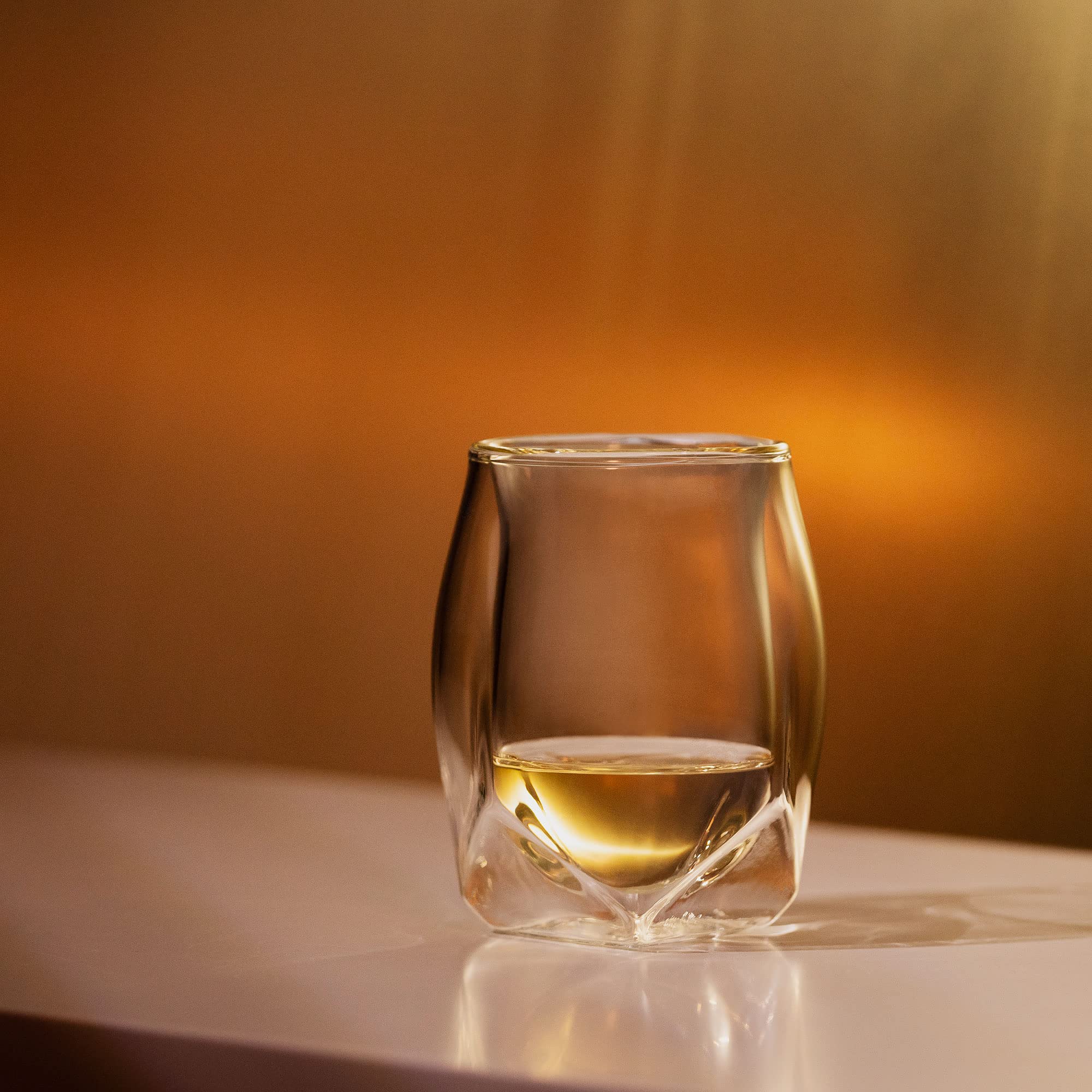 NORLAN glass paired with polishing cloth for streak-free showroom clarity