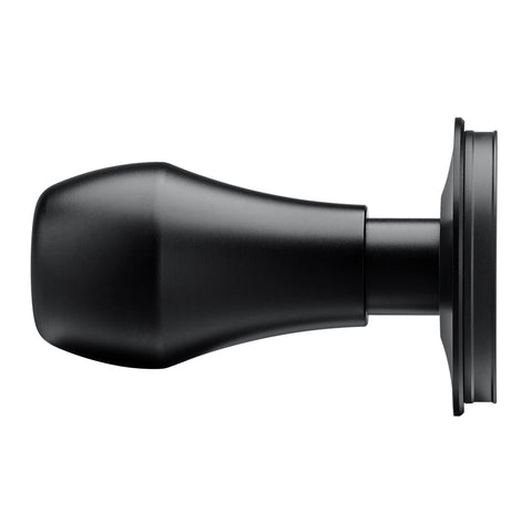 Normcore tamper beside a 58mm basket illustrating precise fit and professional compatibility