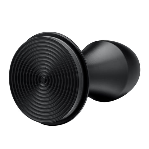 Normcore tamper tamping a puck on an espresso machine for consistent tamping
