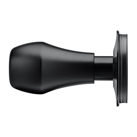 Normcore tamper beside portafilter to show 58.5mm fit and scale