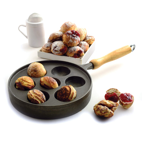 Norpro pan with aebleskiver cooking showing round shape and golden crust