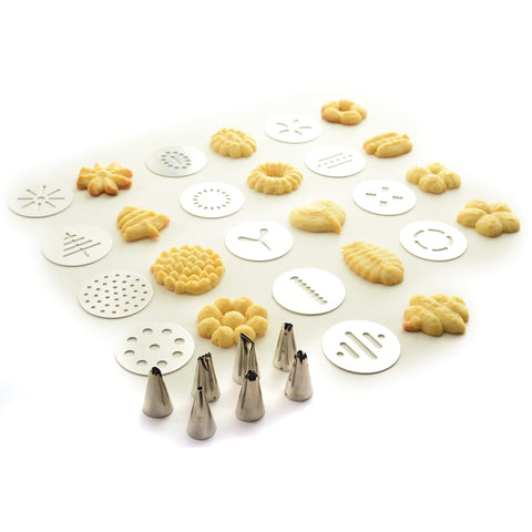 Norpro cookie press extruding dough in use accelerating cookie production and uniformity