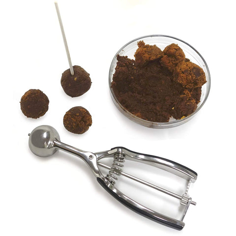 Norpro Grip-EZ being used to scoop cookie dough, demonstrating clean release and consistent portions