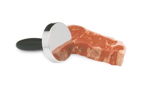 Norpro side profile on cutting board illustrating size and balanced weight