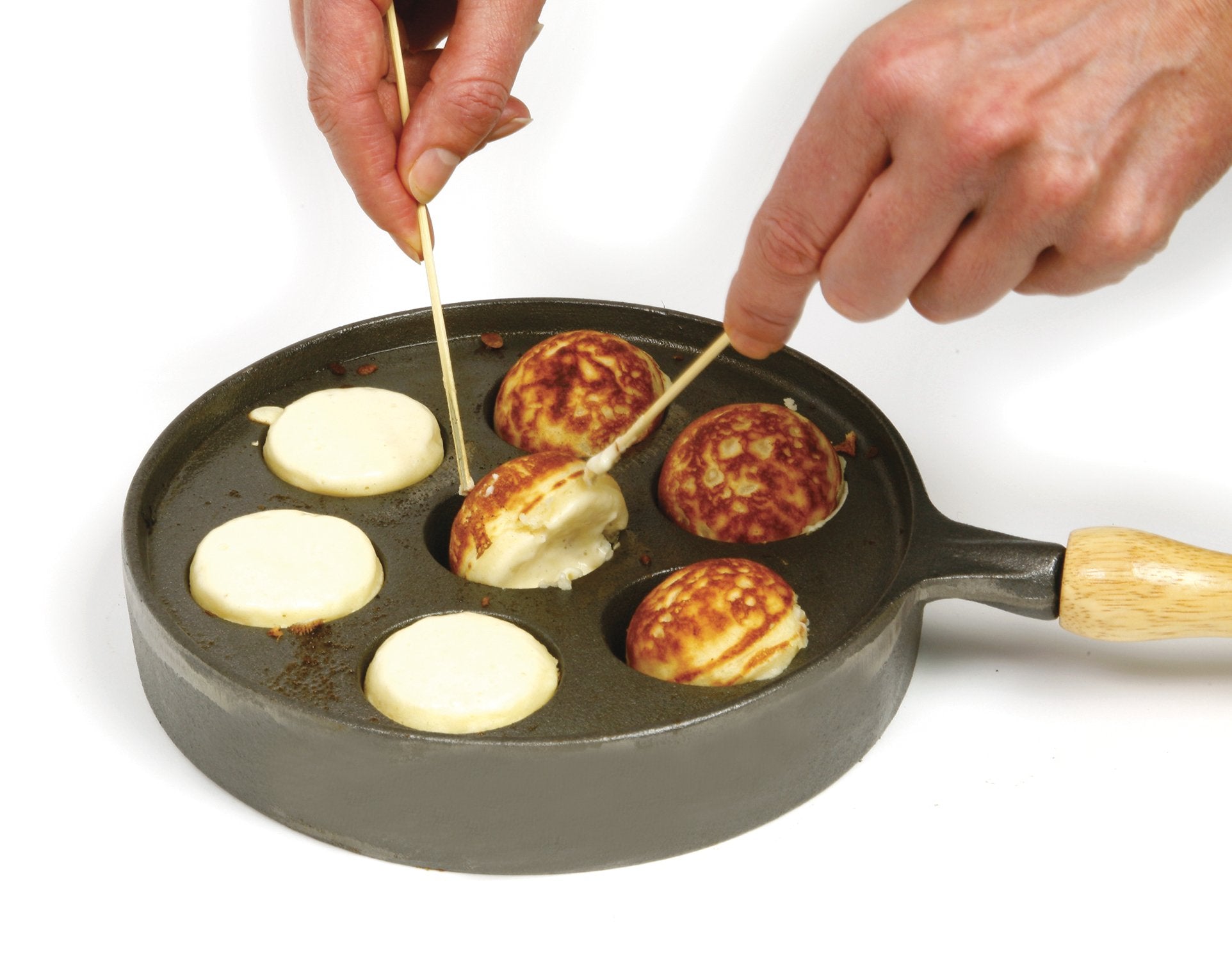 Norpro wooden handle and rivet detail for safe, comfortable maneuvering