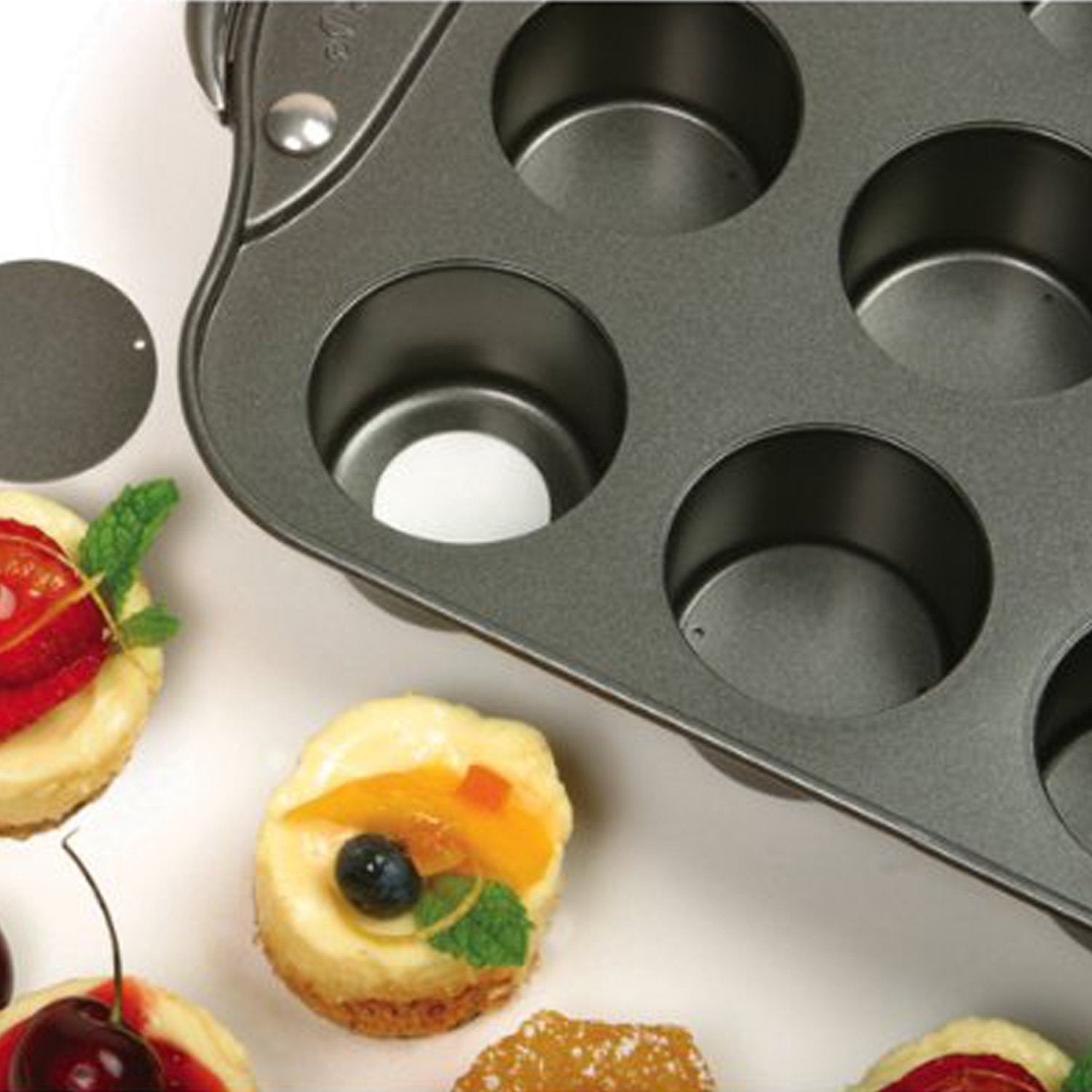 Norpro removable pop-up disc closeup demonstrating easy release and neat presentation