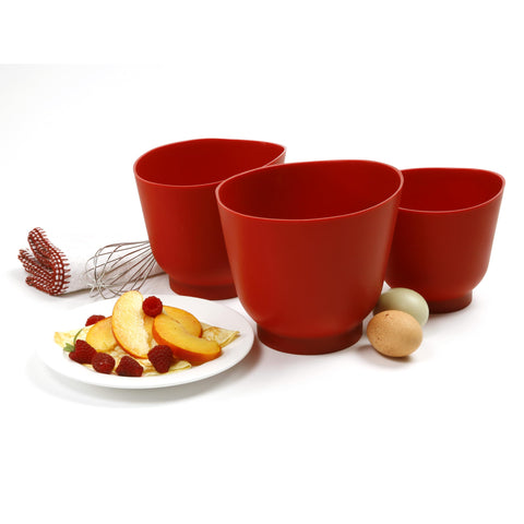 Norpro bowls next to spoon for scale to illustrate size and portioning utility