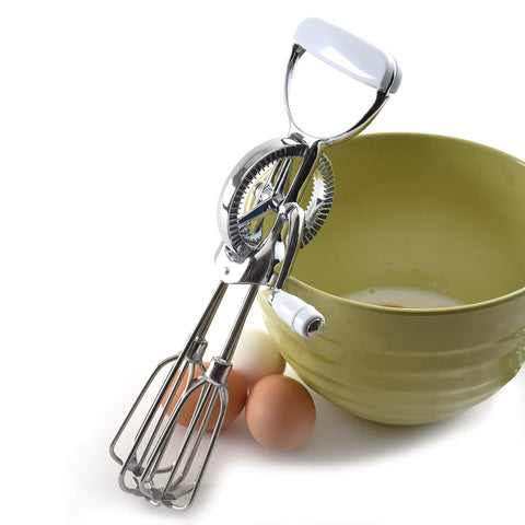 Norpro beater next to measuring spoon for scale, compact storage and portability
