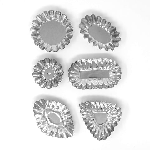 Norpro tartlet tins with baked tarts in use demonstrating uniform portions and presentation