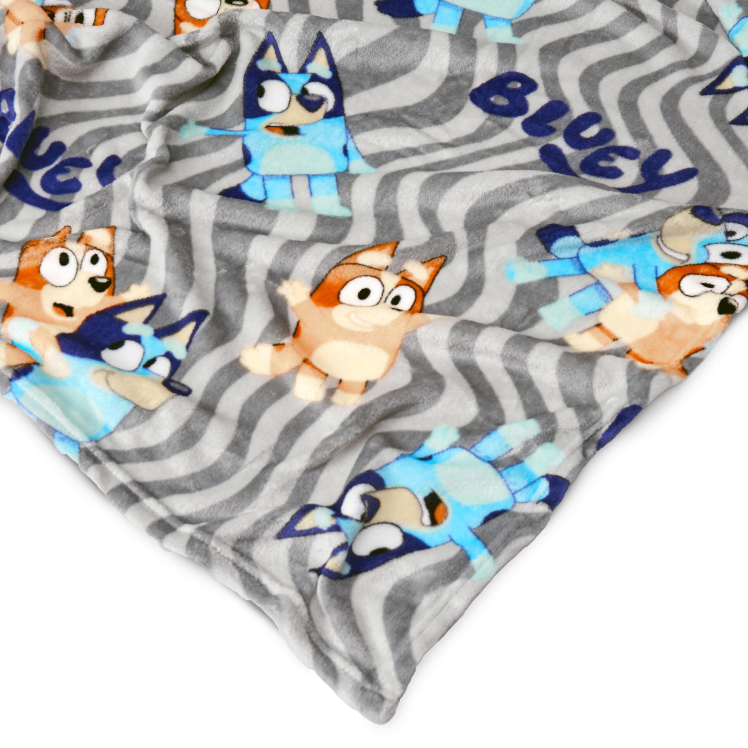 Northwest Bluey blanket in stroller showing travel-friendly convenience