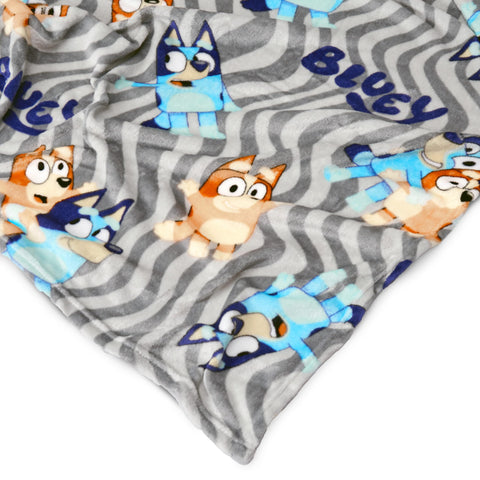 Northwest Bluey blanket in stroller showing travel-friendly convenience
