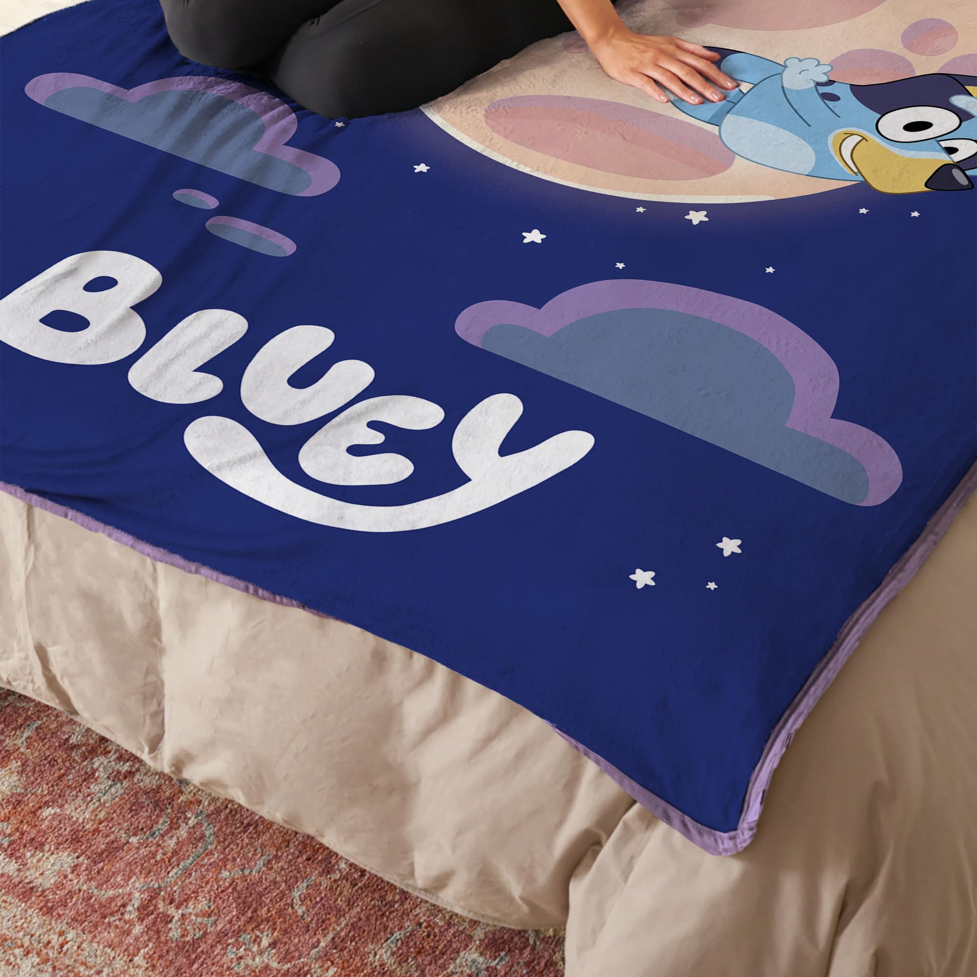 Northwest Bluey blanket draped on sofa adding color and warmth