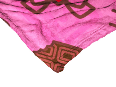 Northwest Hello Kitty draped on sofa illustrating decorative accent and warm layering