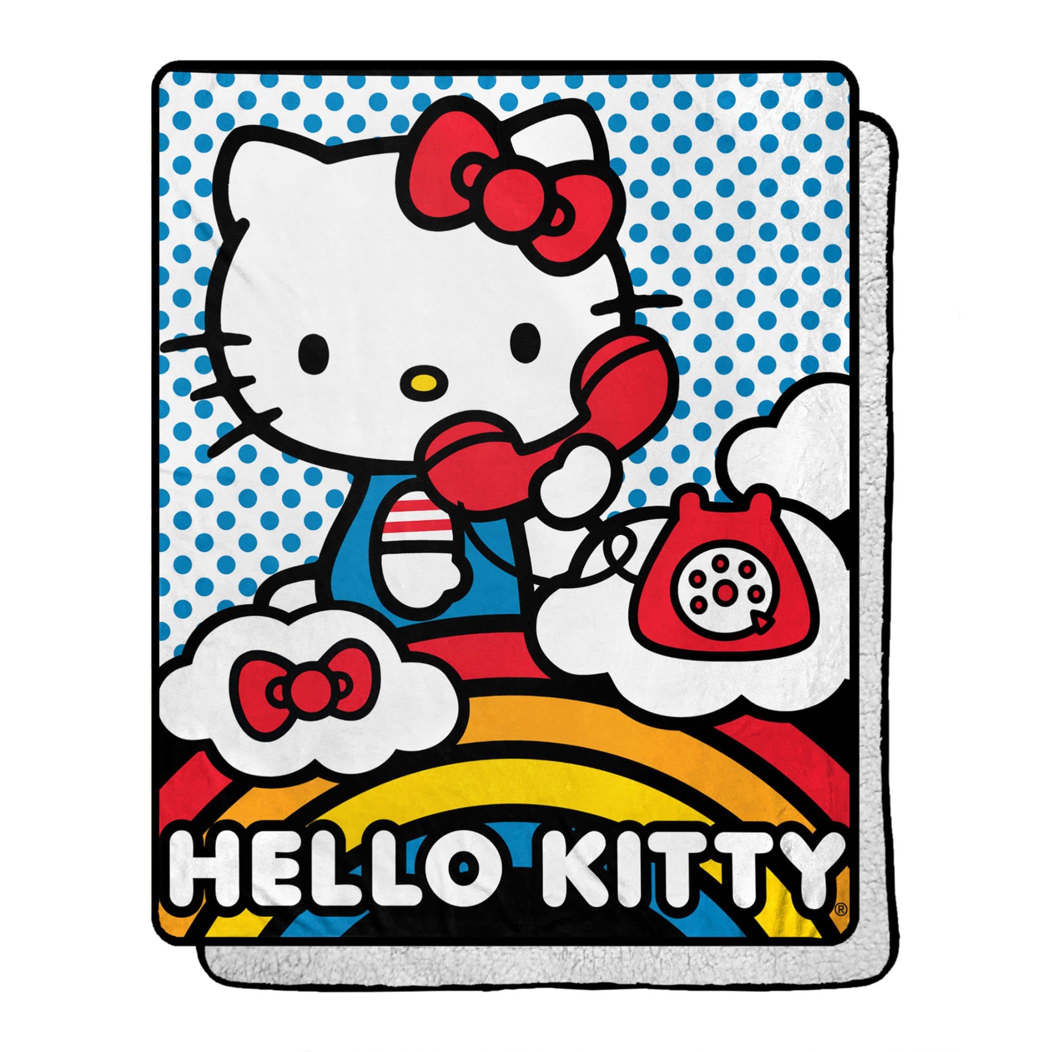 Northwest Hello Kitty draped on sofa showing cozy use and colorful accent in living room