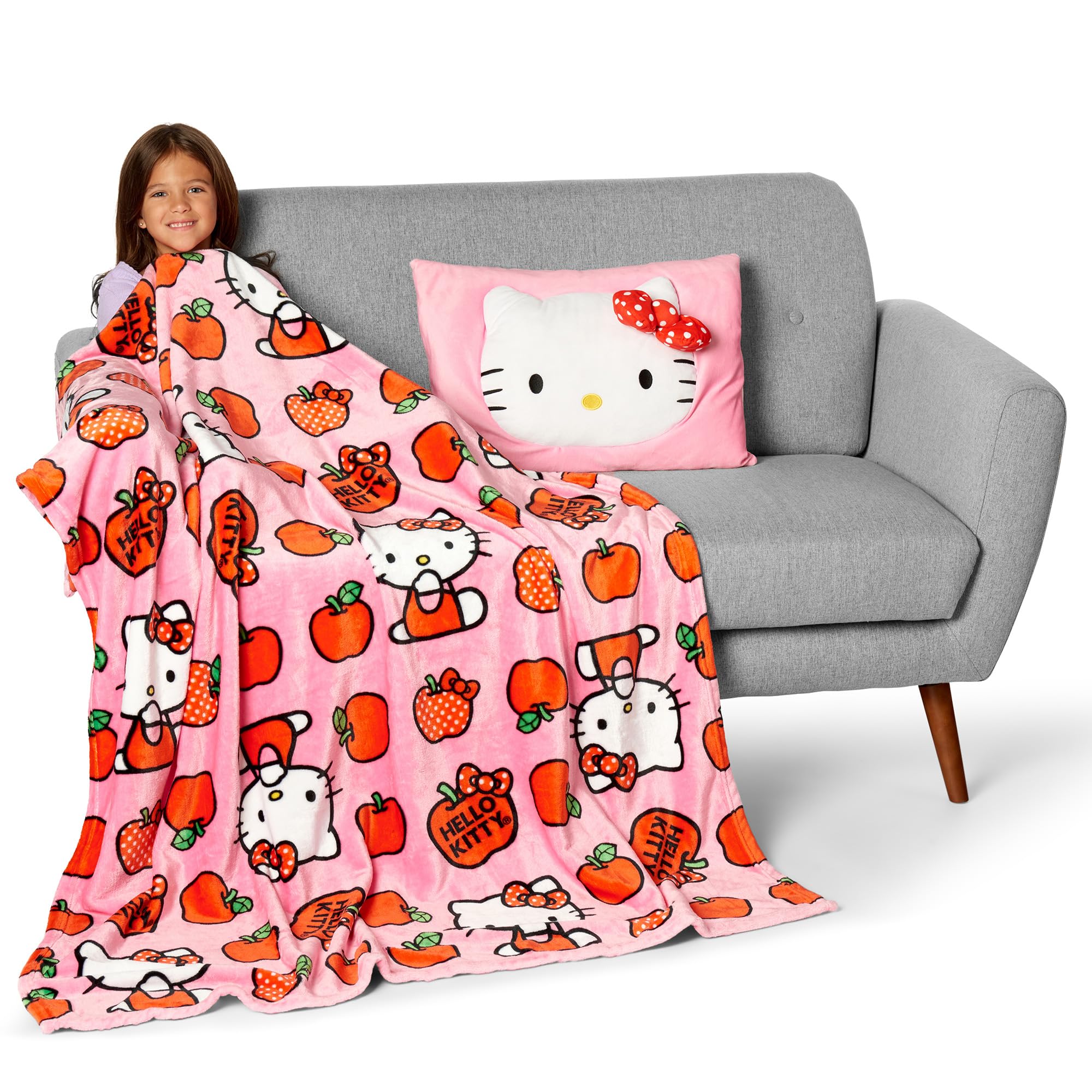Northwest Hello Kitty throw on sofa showing true size and everyday living-room use