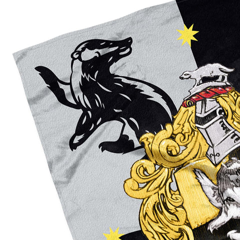 Northwest Hufflepuff throw draped over sofa adding cozy fandom decor