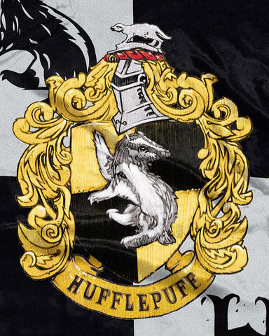Northwest Hufflepuff blanket next to ruler illustrating 50 by 60 size