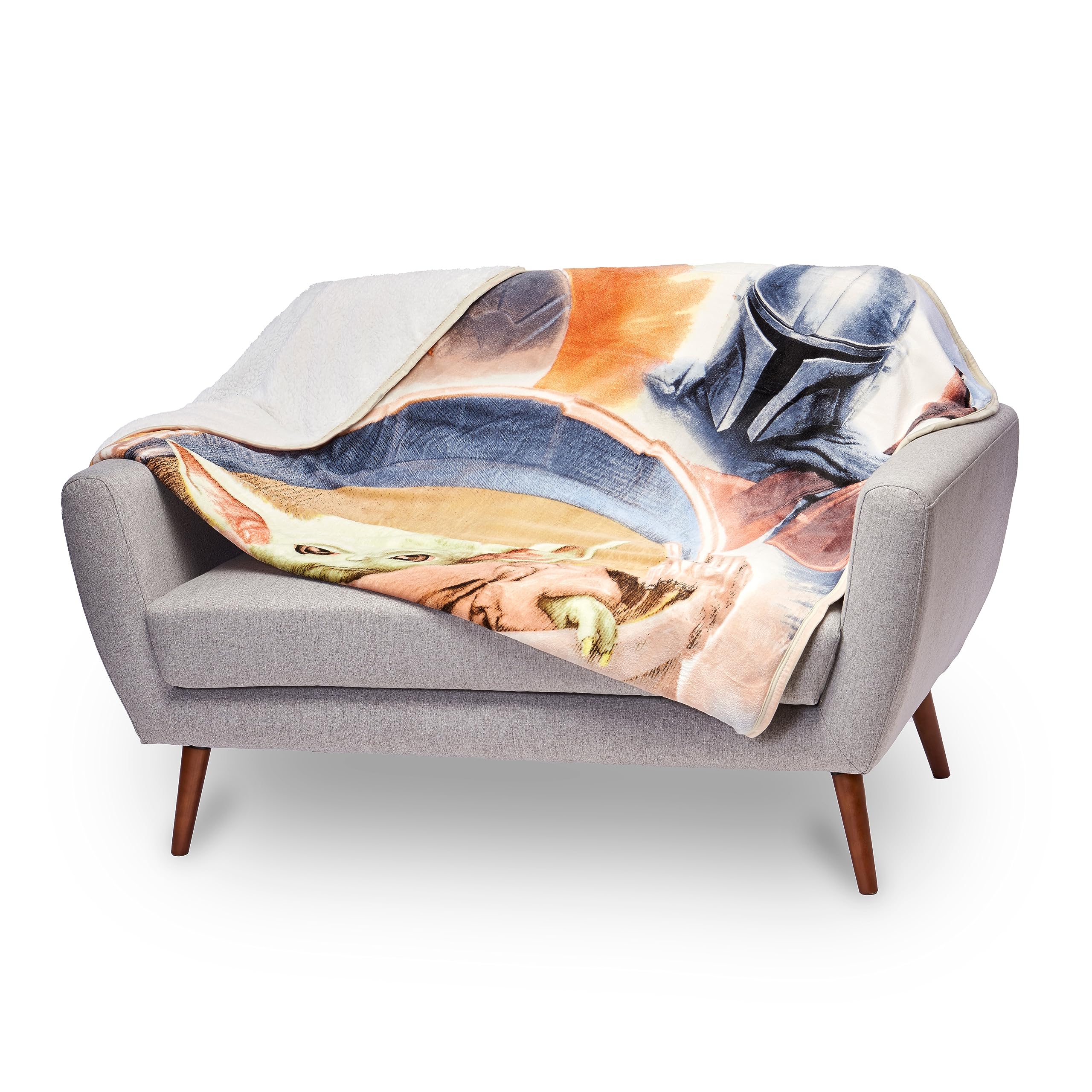 Northwest Mandalorian throw on sofa lifestyle scene adding fandom style and cozy comfort