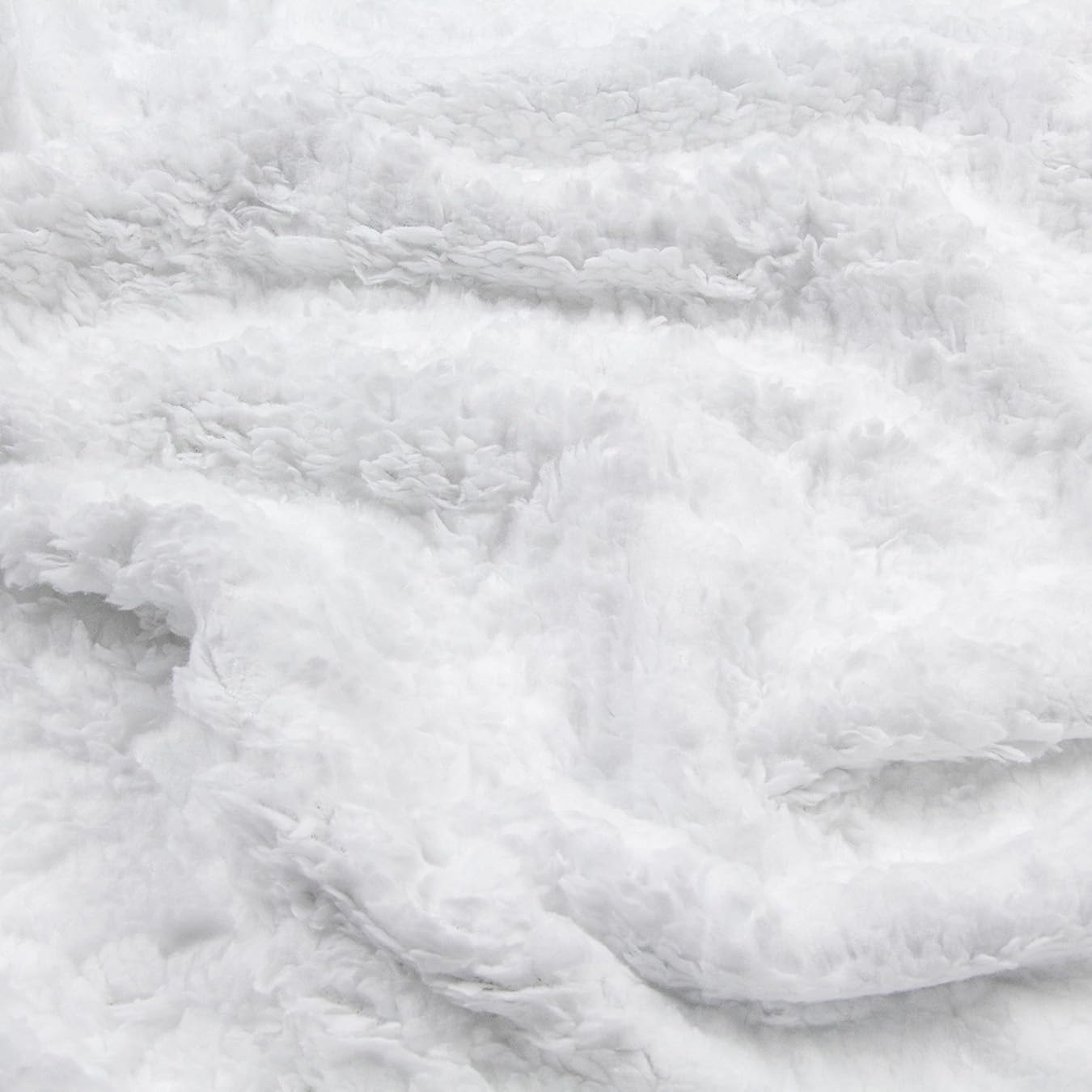Northwest Mickey size on bed demonstrating full coverage and warmth