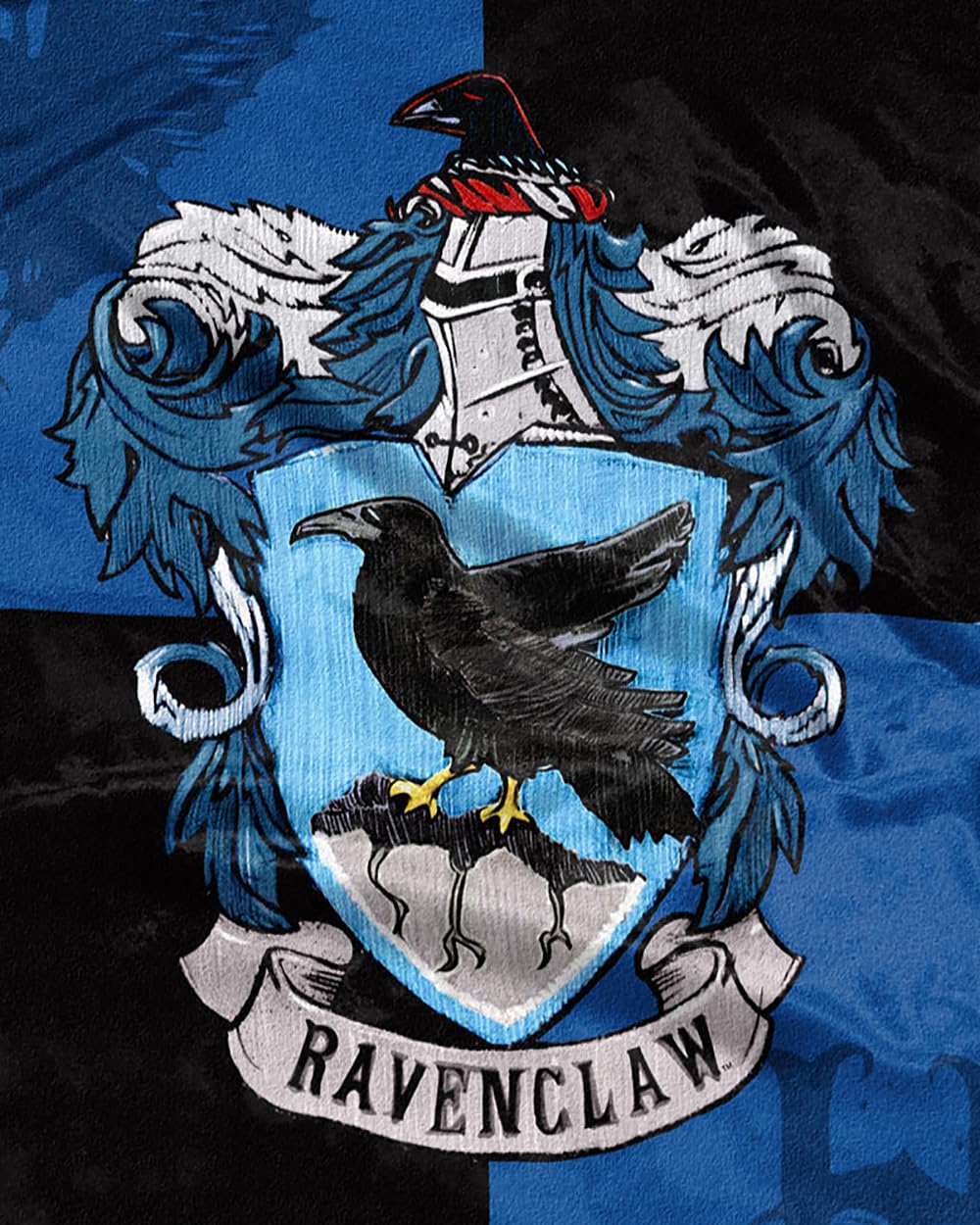 Northwest Ravenclaw next to a pillow demonstrating 50x60 size and coverage