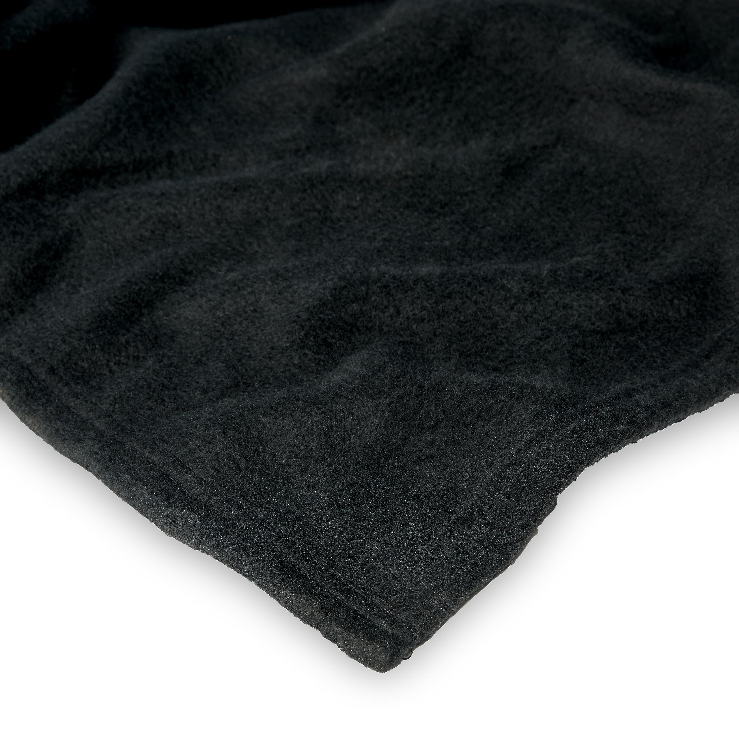 Northwest size comparison on chair showing generous 48x71 inch coverage