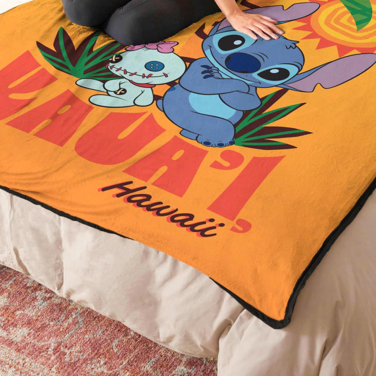 Northwest Stitch throw draped on couch showing cozy use and decorative impact