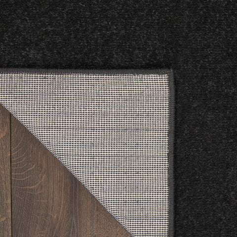 Nourison serged edge detail displaying reinforced border and longevity