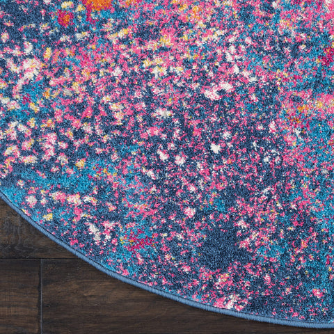 Nourison Passion in living room illustrating how the round rug anchors a seating area
