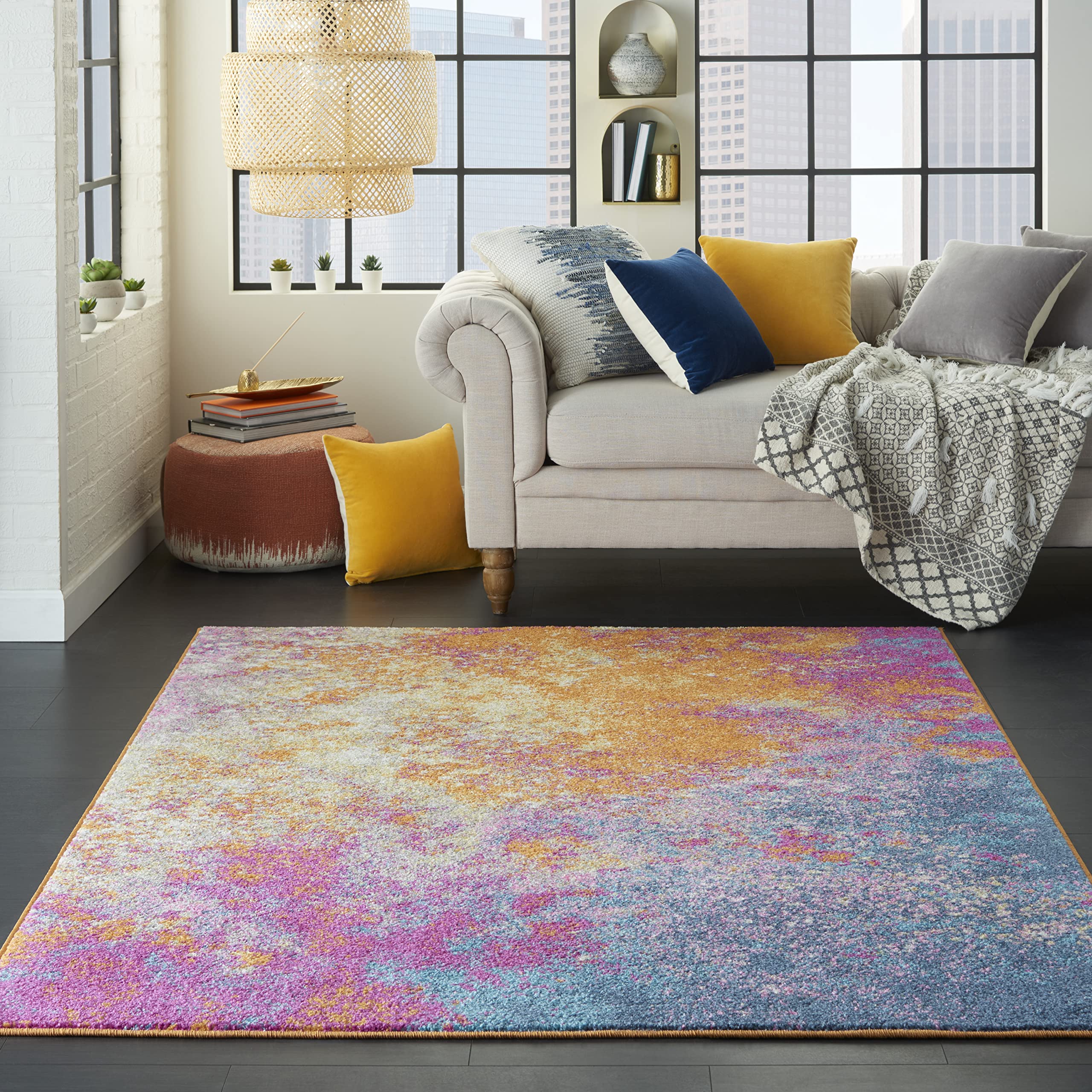 Nourison Passion Sunburst front view shows bold color and centerpiece impact