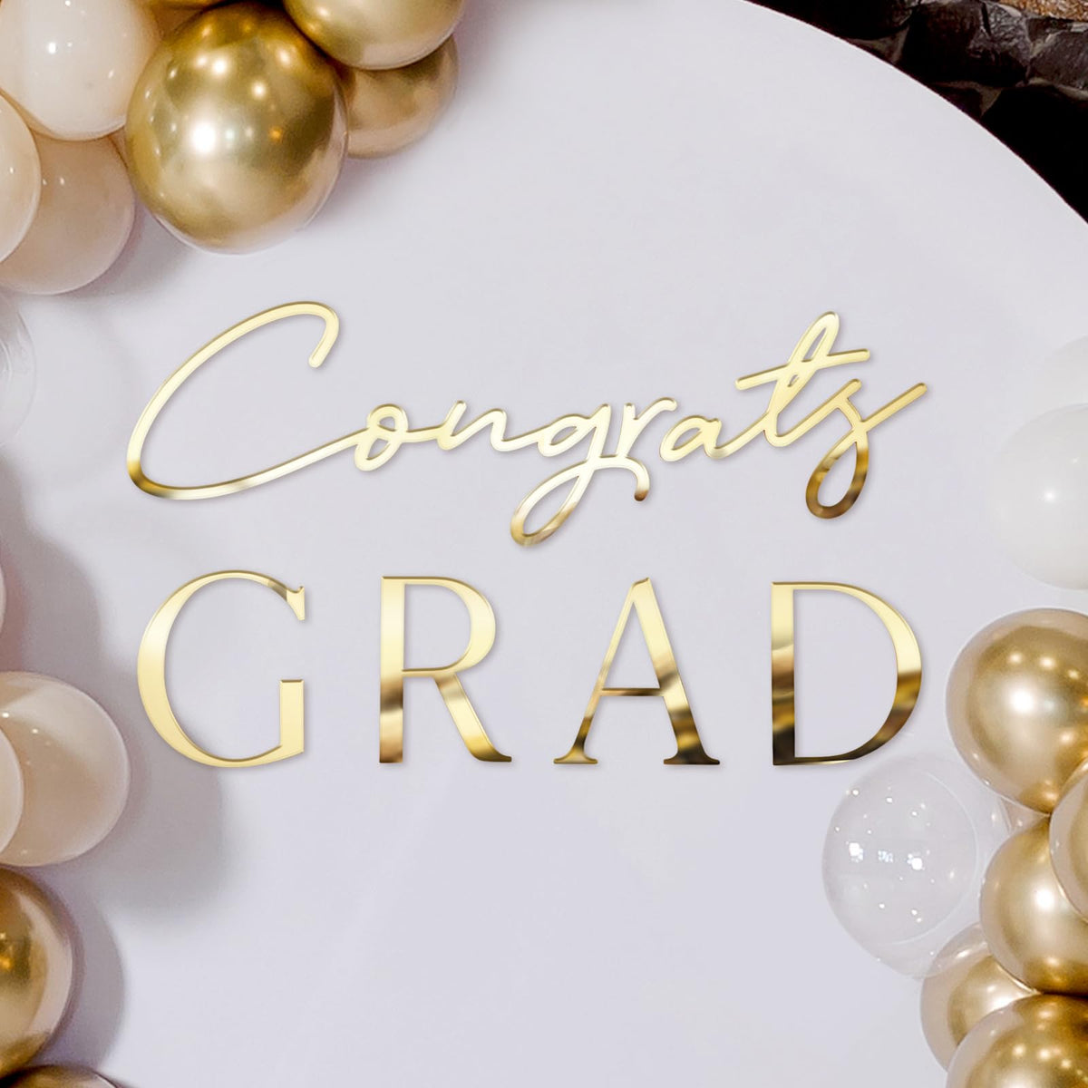 Novabright front view of gold Congrats Grad decal for instant party impact