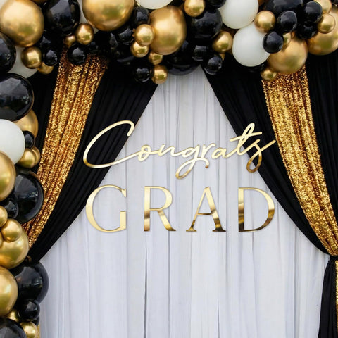 Novabright photo booth setup illustrating celebratory backdrop benefit