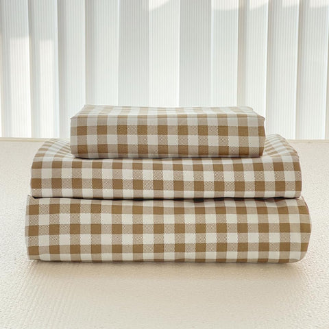 NSNLGSGC front view of tan gingham queen sheet set shows tidy packaging and pattern benefit