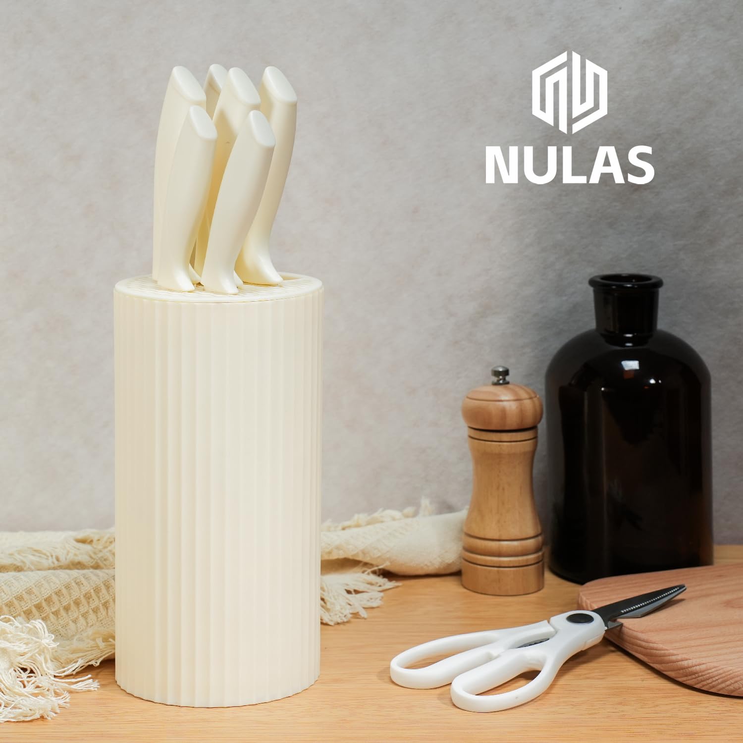NULAS set beside common items showing scale for accurate size reference