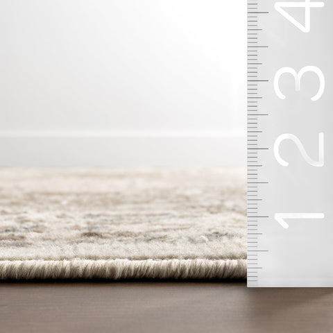 nuLOOM Becca under dining table showing coverage and chair-motion protection benefit