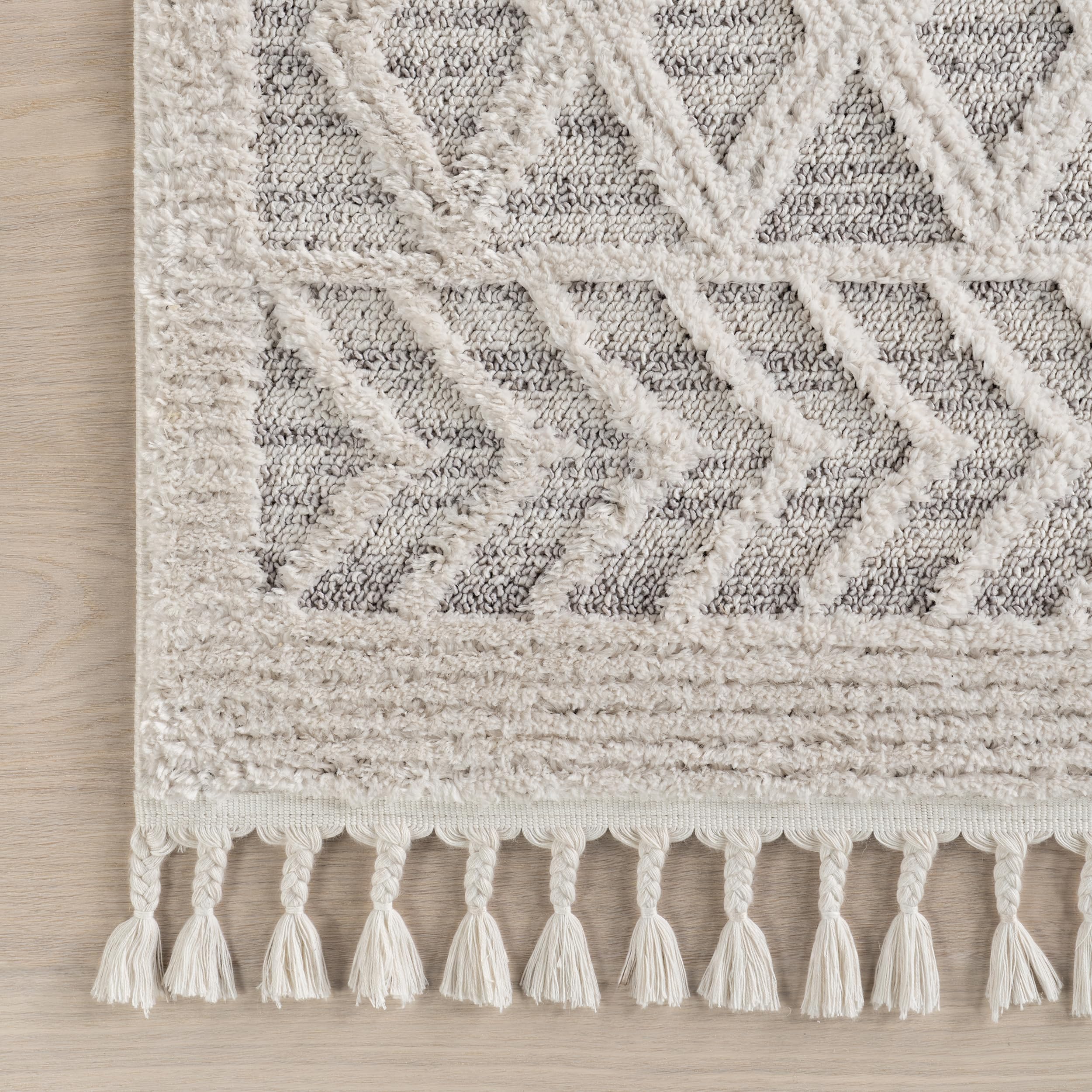 nuLOOM tassel edge close-up adding handcrafted detail and decorative appeal benefit