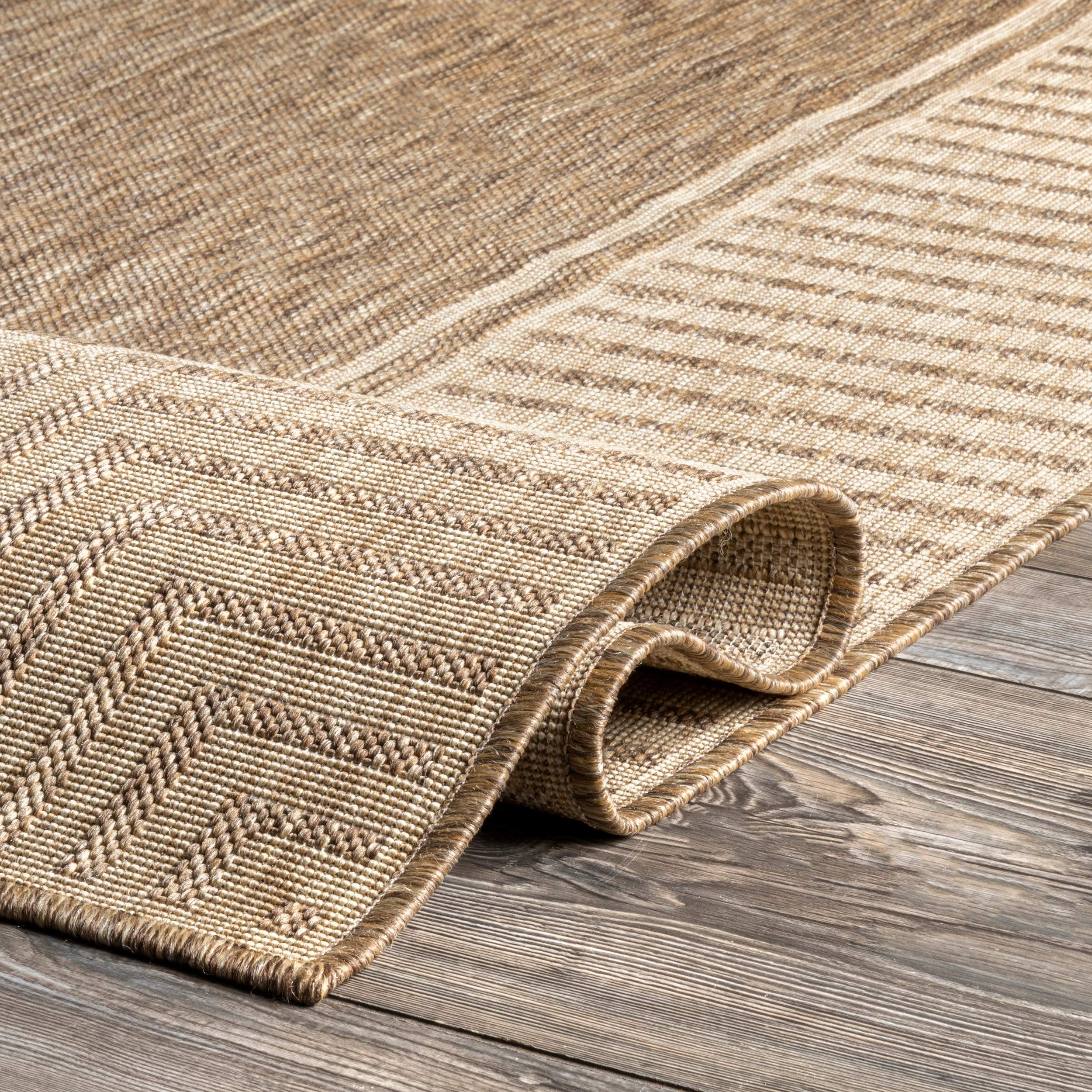 nuLOOM Asha placed in kitchen under table demonstrating easy-to-clean practicality