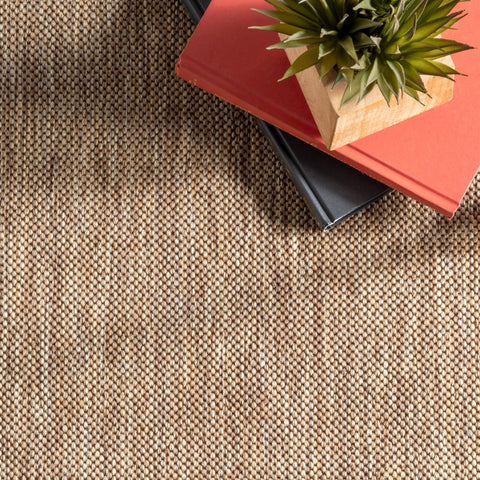 nuLOOM Asha on covered patio illustrating outdoor-ready look and comfortable seating