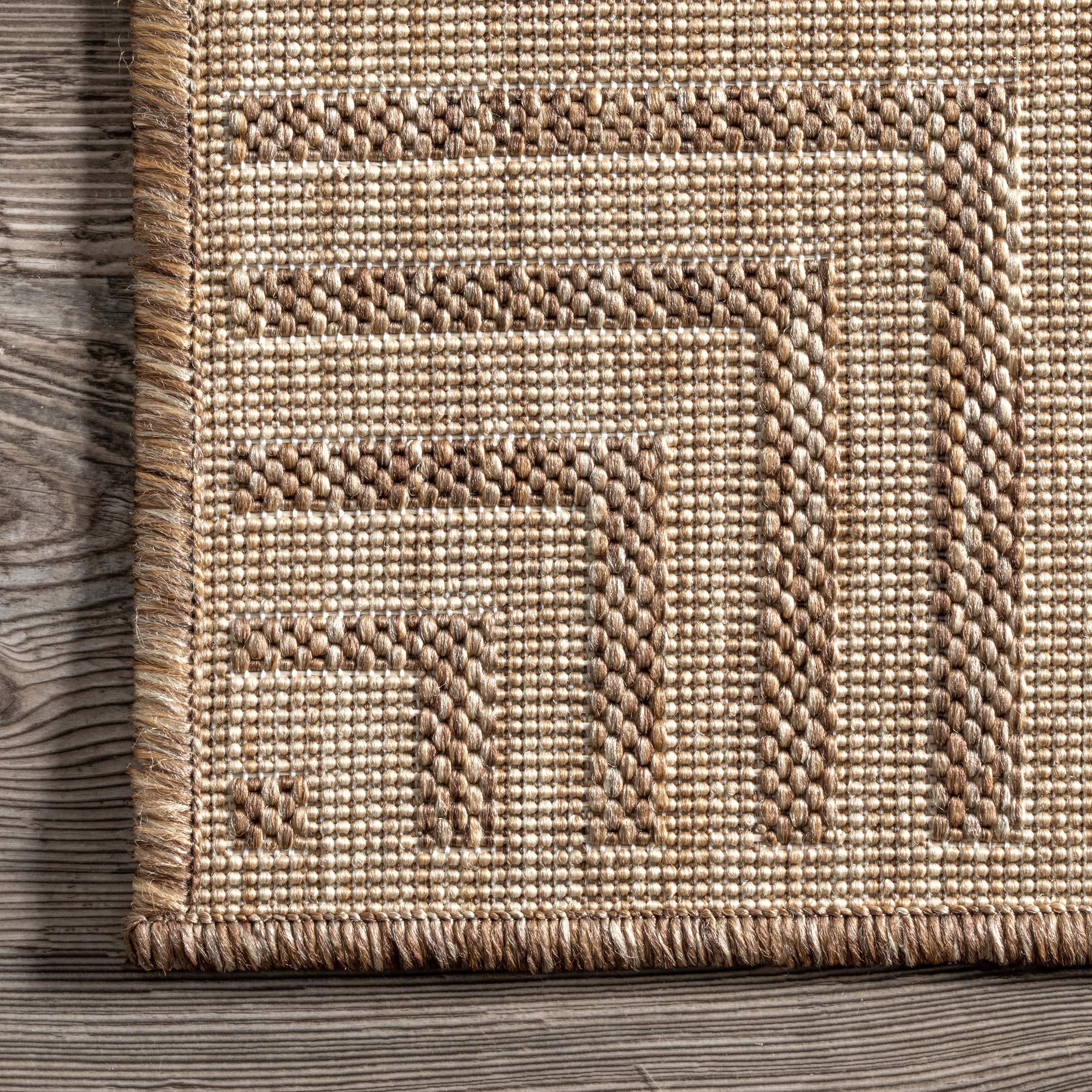nuLOOM Asha next to chair showing scale and how it anchors small seating areas