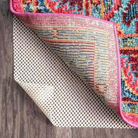 nuLOOM pad being trimmed with scissors to fit a custom runner for perfect fit